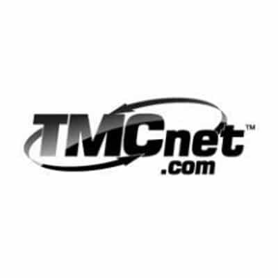 The image shows the TMCnet logo. It consists of the letters TMC in bold, with net in smaller font next to it, followed by .com below. There is a curved arrow encircling the text.