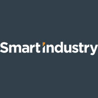 The image shows the Smart Industry logo with white text on a dark background. The letter i in industry is stylized with an orange top, resembling an upright exclamation mark.