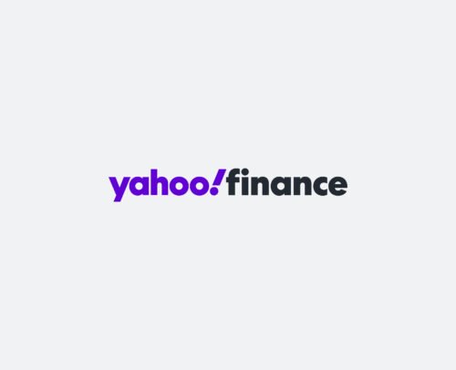 Logo of Yahoo Finance with yahoo! in bold purple text and finance in black text on a light gray background.